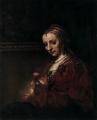 Rembrandt. Femme avec un œillet (1664)